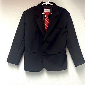 Boys black suit with red and white striped clip on tie
